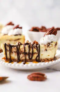 slice of turtle cheesecake on a plate